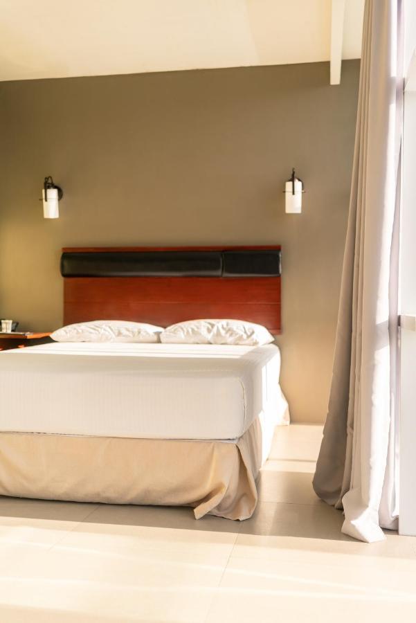 Dosi Hotel Ph Талисей Екстериор снимка